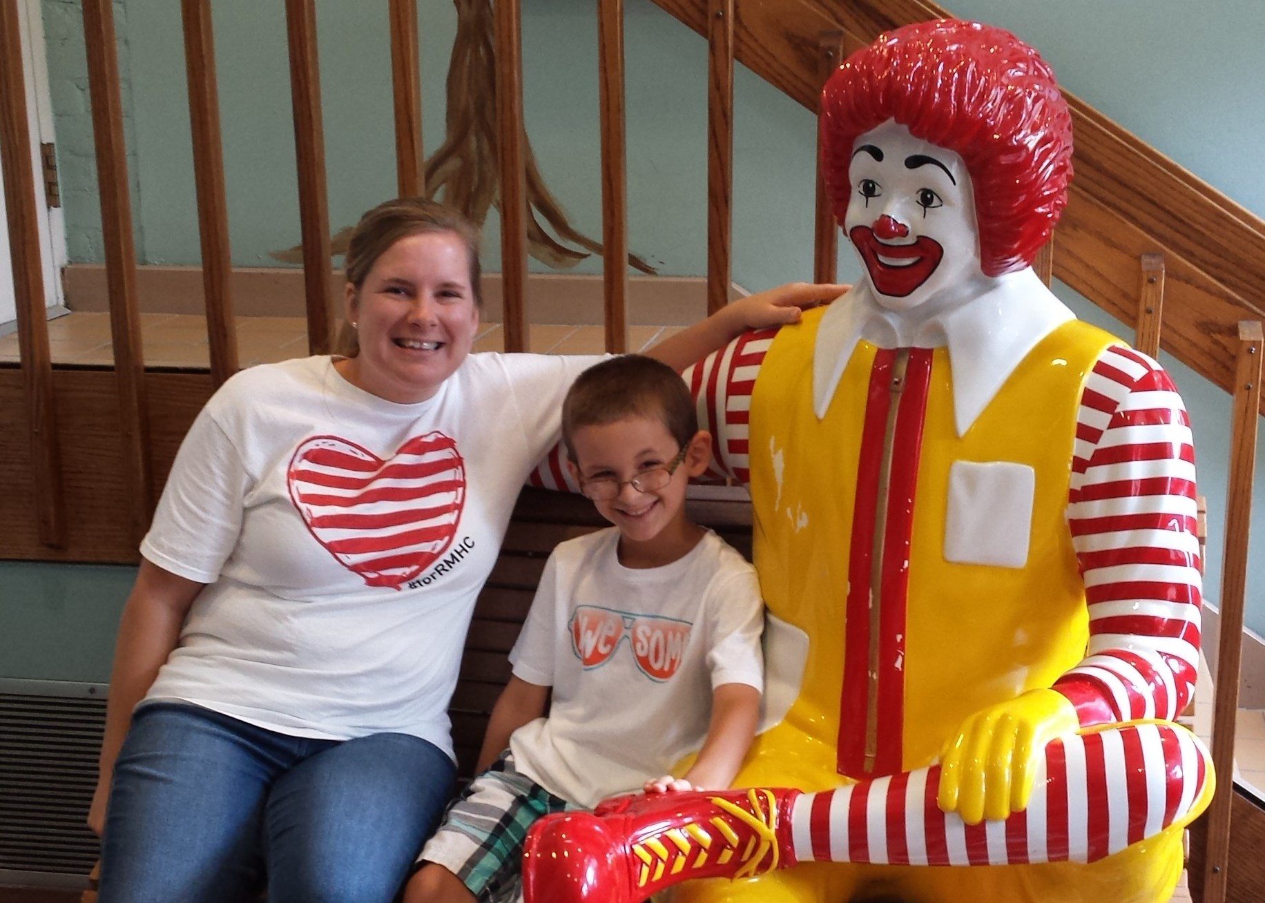 christina and ben with Ronald McDonald bench